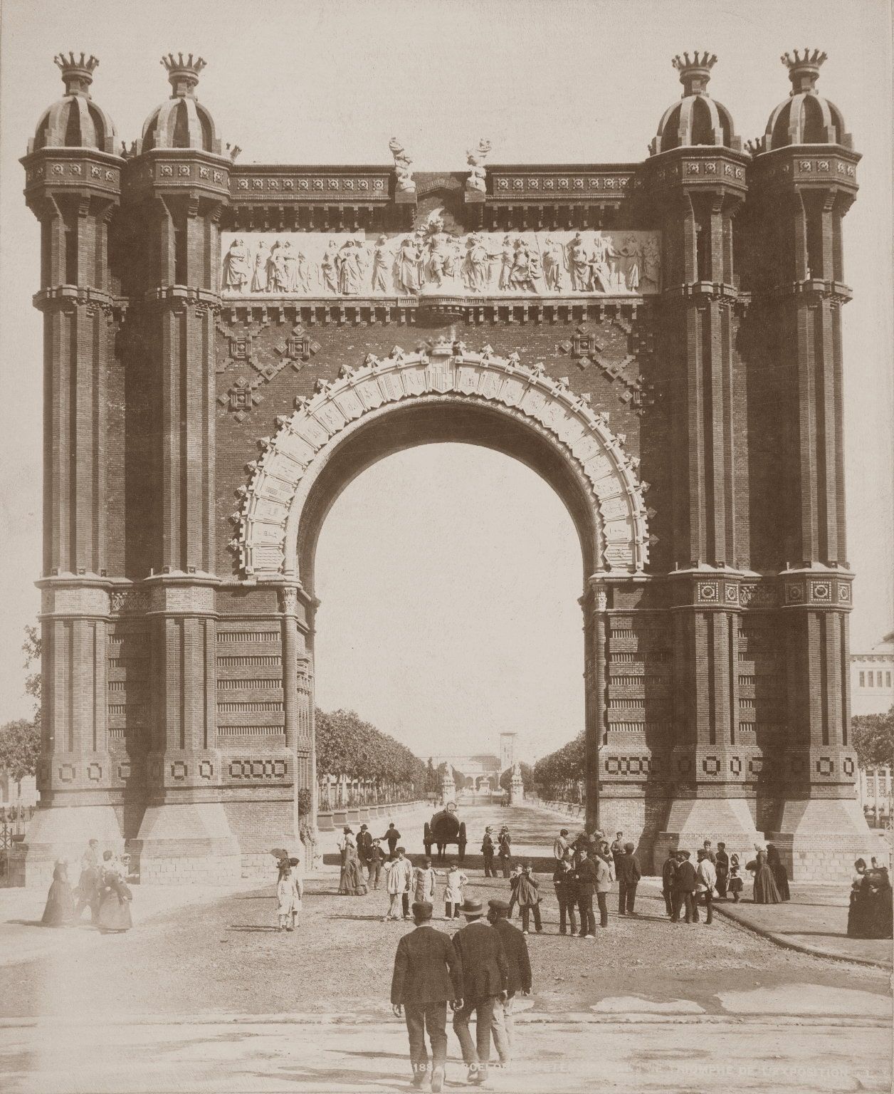 A black and white photo of a large archway