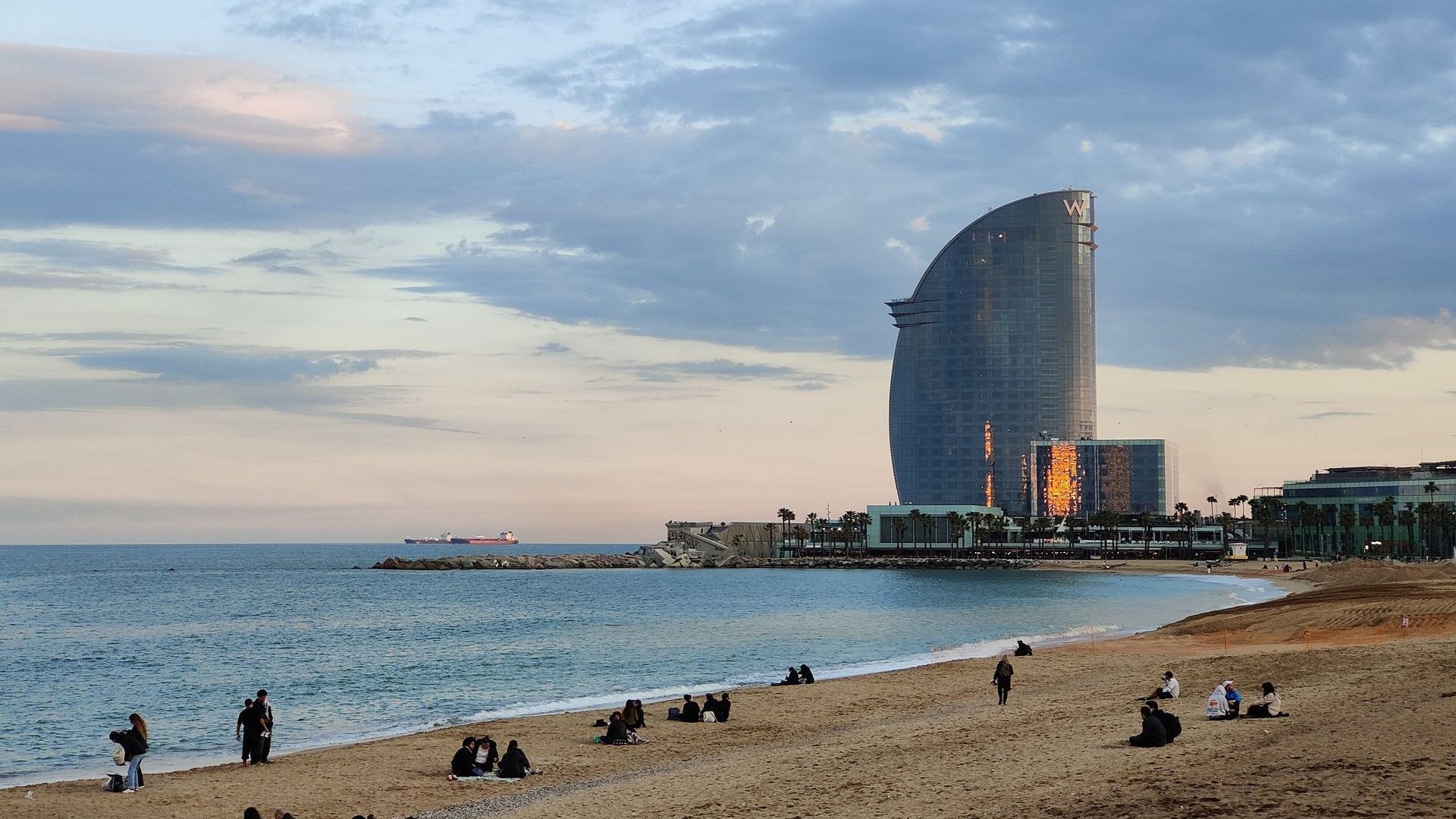 Barcelona Barceloneta A beach with a large building in the background