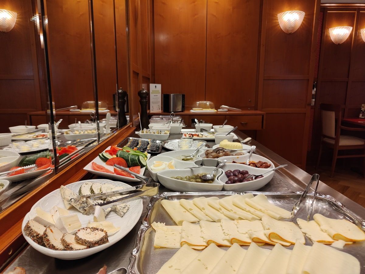 A buffet table with a lot of food on it