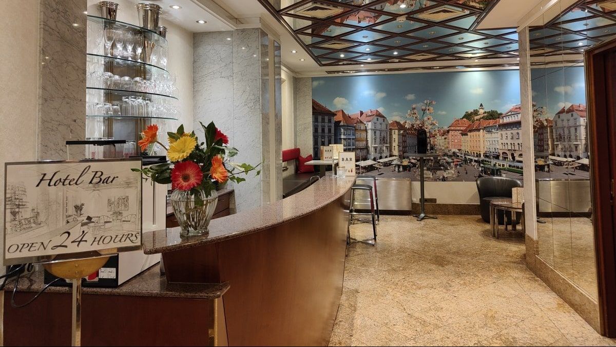 A hotel bar with a sign that says hotel bar