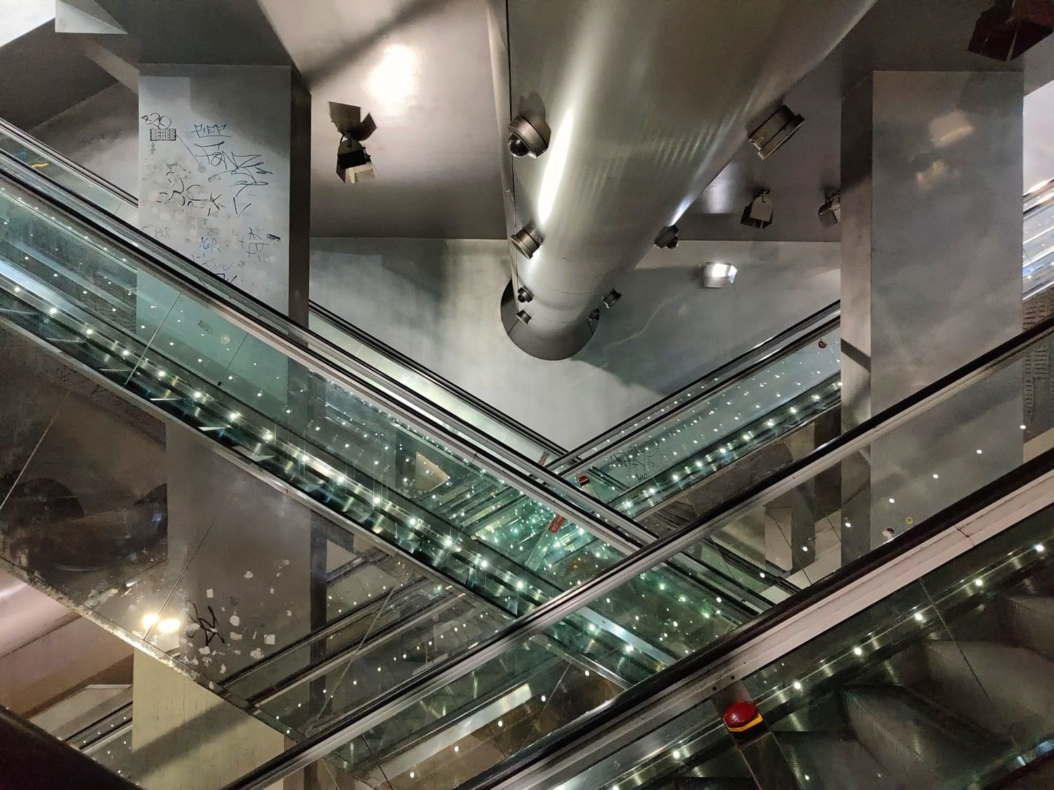 Looking up at a set of escalators in a building