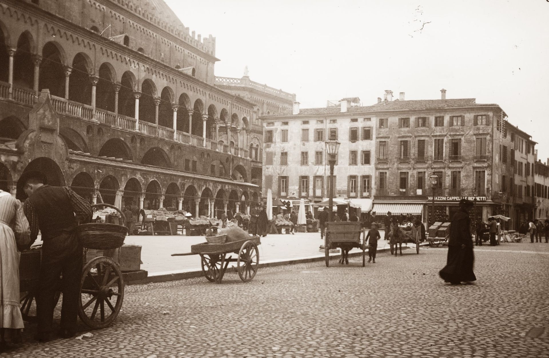 A black and white photo of a city square