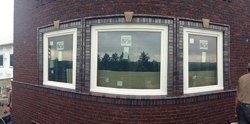 Custom brick borders around windows - Skilled residential masonry contractor in Columbus, NE