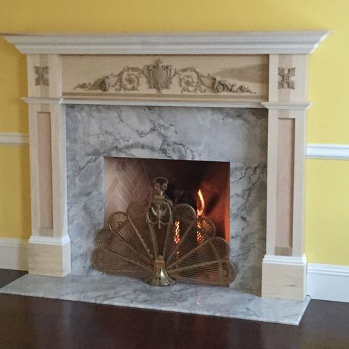 Custom marble front fireplace - Custom fireplace construction in Columbus, NE
