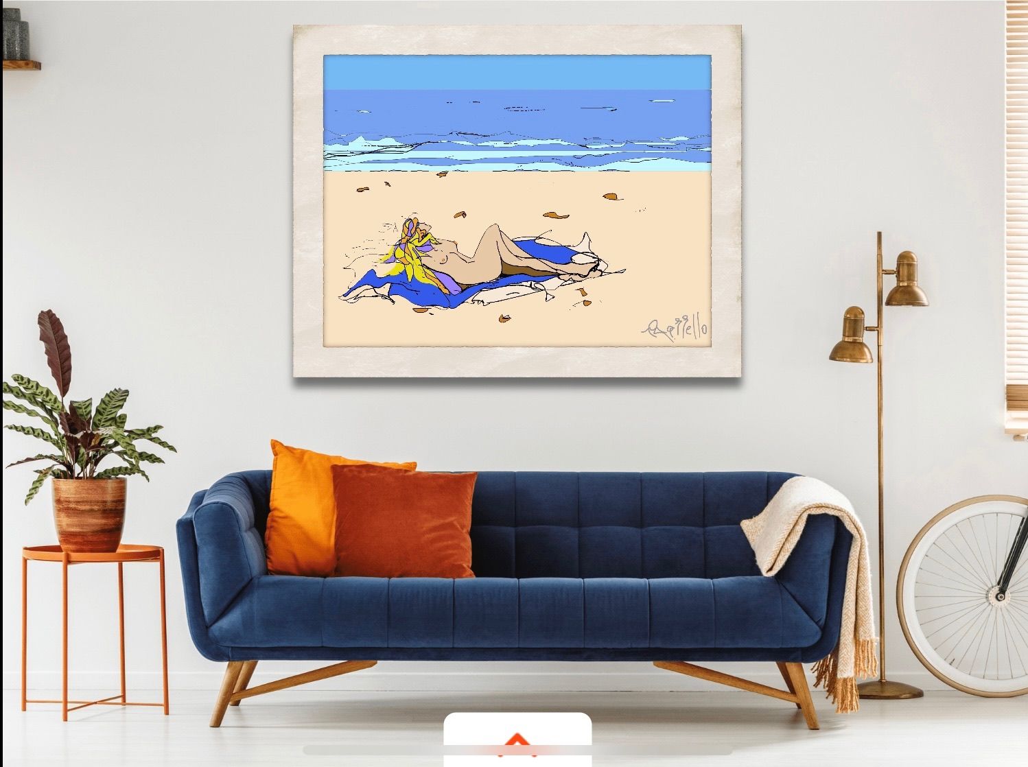 A living room with a blue couch and a painting on the wall