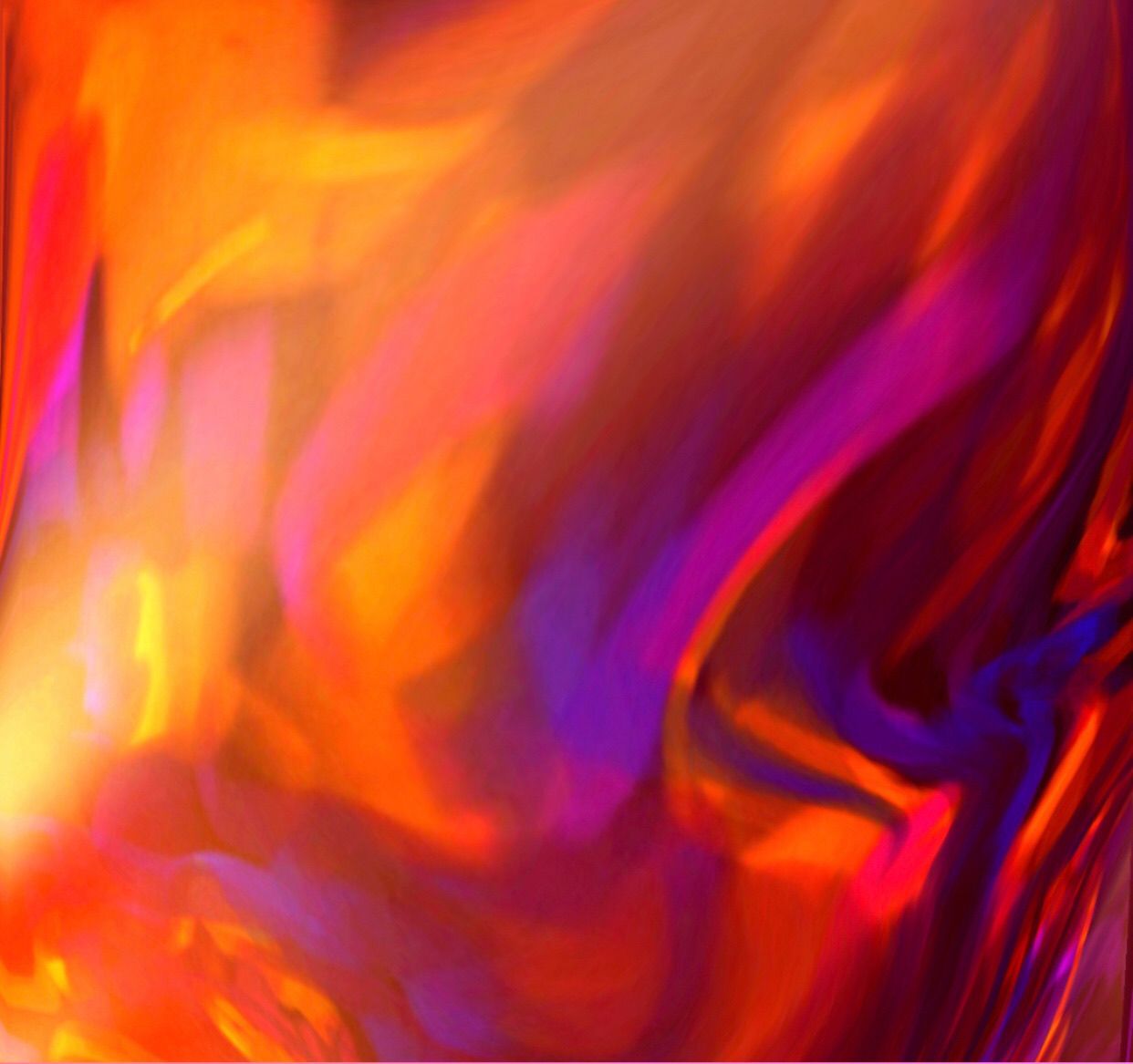 A close up of a colorful abstract painting of a fire.