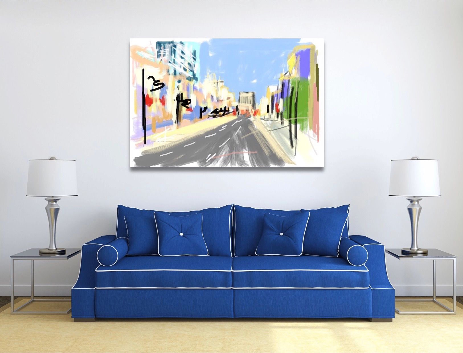 A living room with a blue couch and a painting on the wall