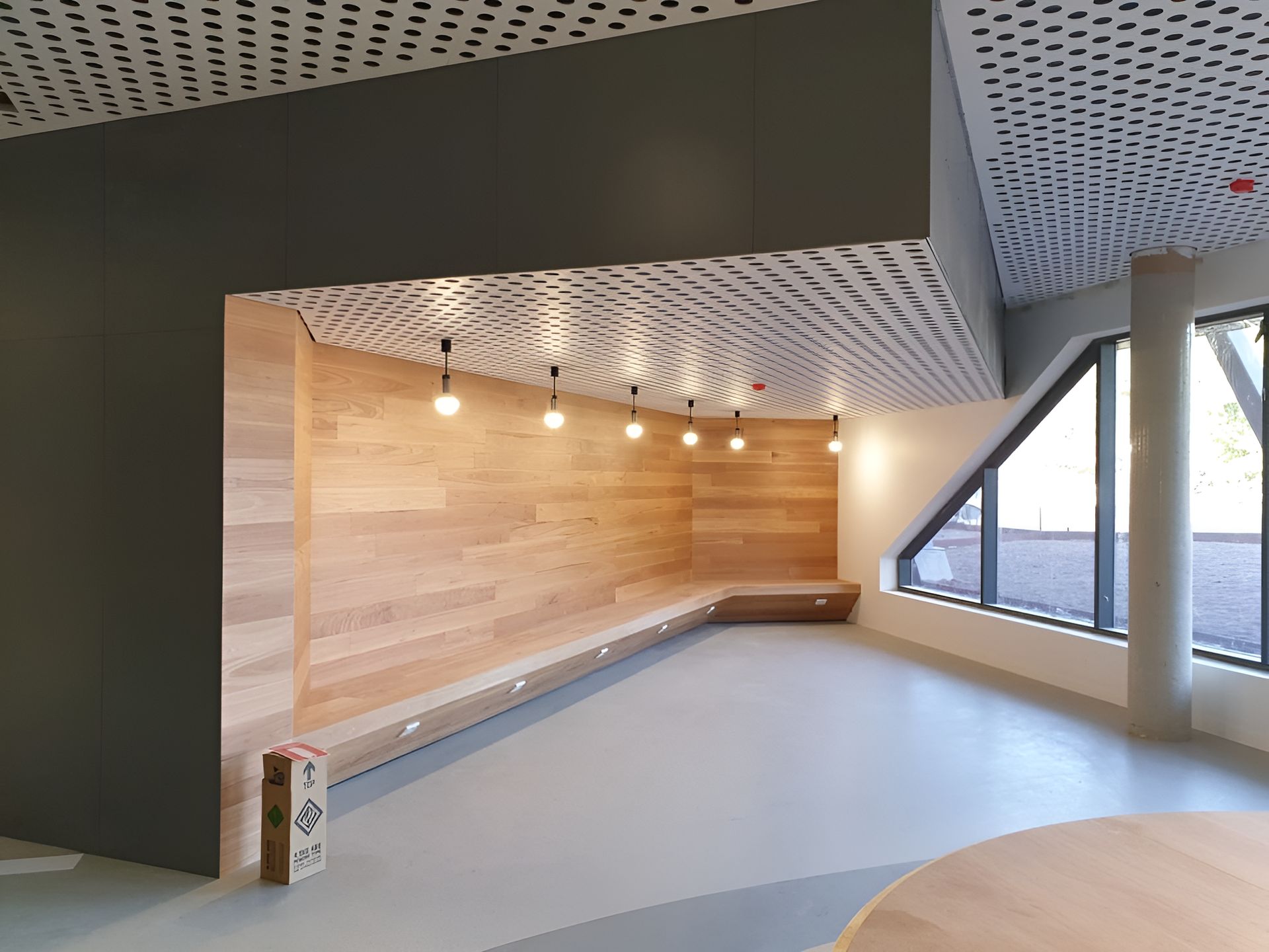 A Room With A Wooden Wall And A Table In It  — Waltlec Industries In Garbutt, QLD