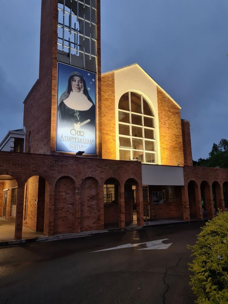 A Large Brick Building With A Sign On The Side — Waltlec Industries In Garbutt, QLD