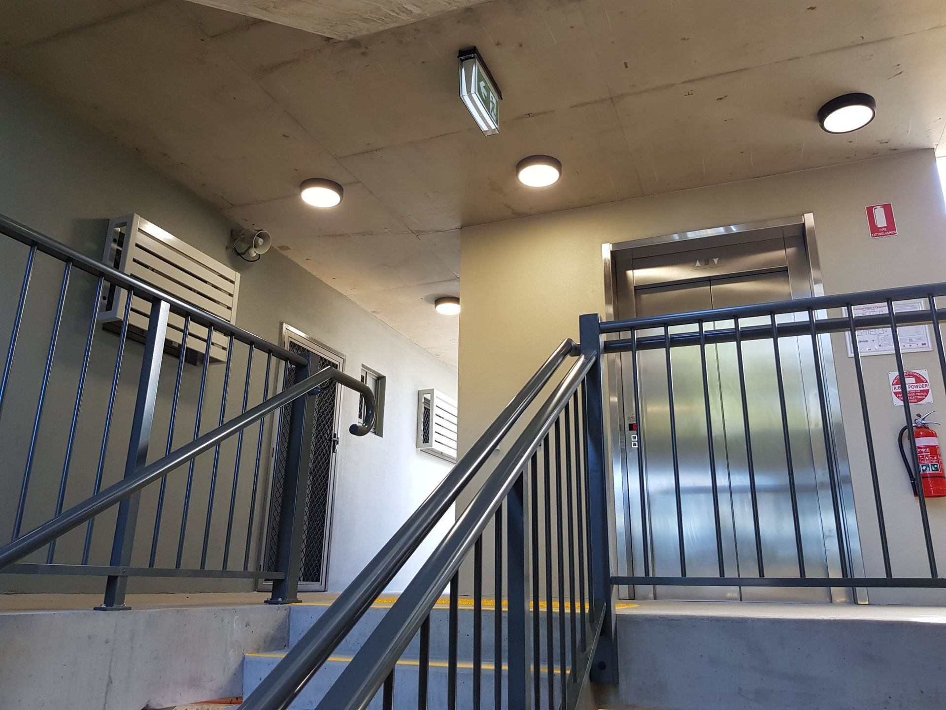 A Staircase With A Metal Railing — Waltlec Industries In Garbutt, QLD