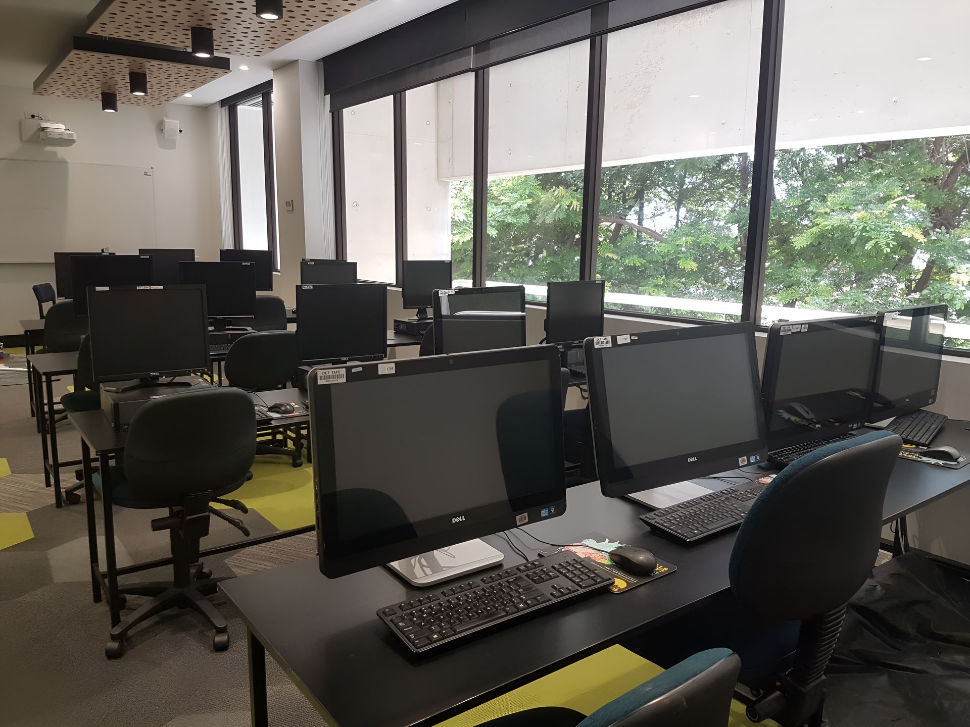 A Classroom With A Lot Of Computers And Chairs  — Waltlec Industries In Garbutt, QLD