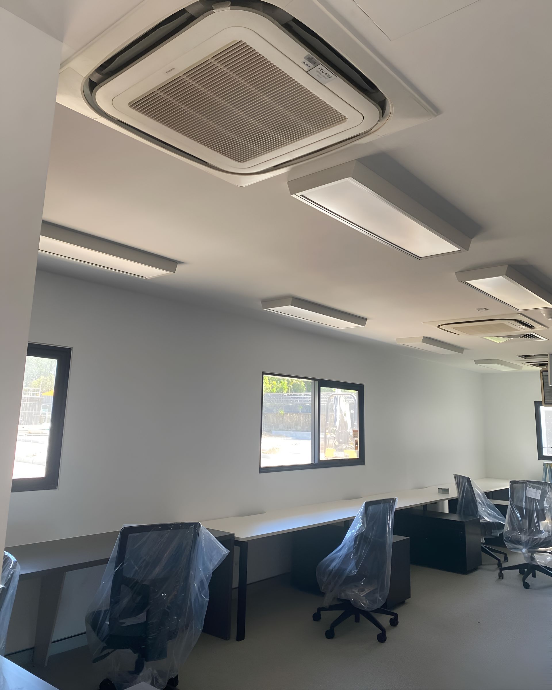 A Room With A Ceiling Fan And A Lot Of Windows — Waltlec Industries In Garbutt, QLD