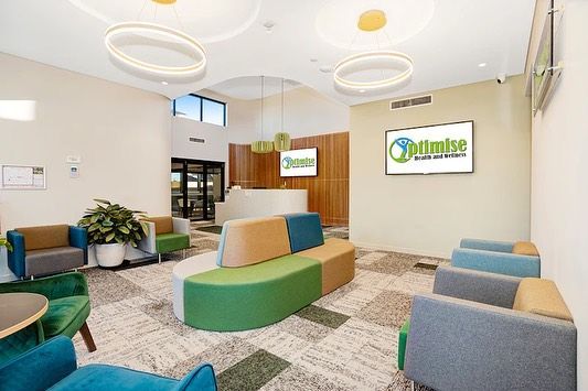 A Waiting Room With A Lot Of Colorful Furniture And A Sign — Waltlec Industries In Garbutt, QLD