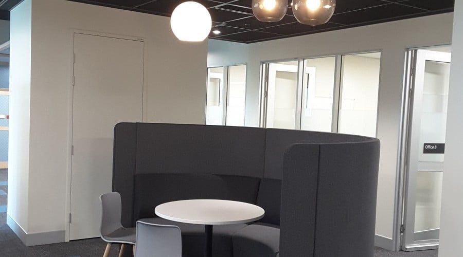 A Booth with A Table and Chairs in The Middle of The Room — Waltlec Industries In Garbutt, QLD
