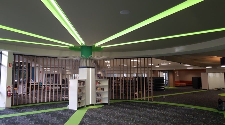 A Large Empty Room with Green Lights on The Ceiling — Waltlec Industries In Garbutt, QLD