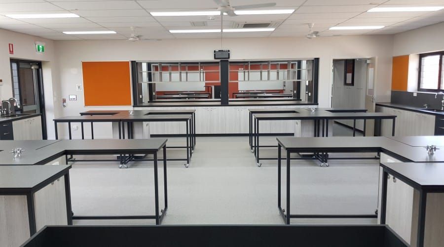 A Large Room with Tables and Chairs in It — Waltlec Industries In Garbutt, QLD