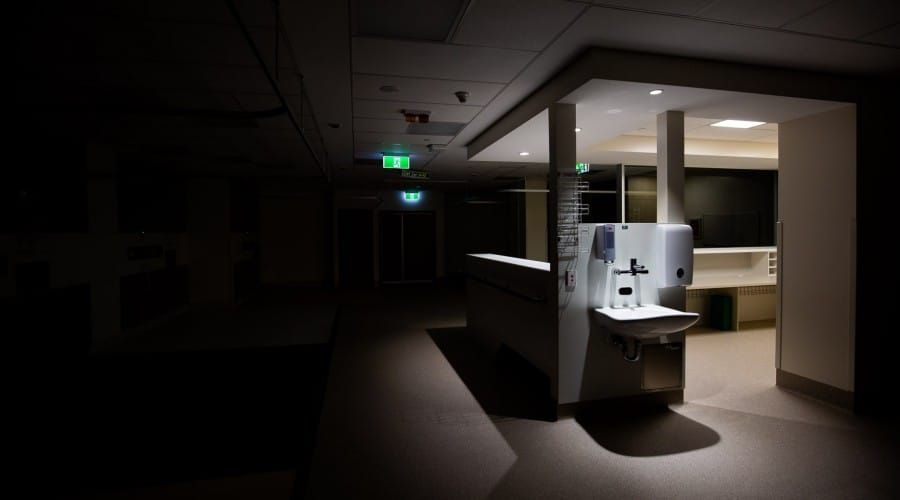 A Dark Hallway with A Sink in The Middle of It — Waltlec Industries In Garbutt, QLD