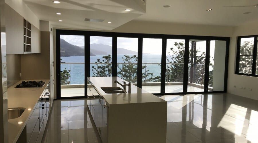A Kitchen with A View of The Ocean and Mountains — Waltlec Industries In Garbutt, QLD