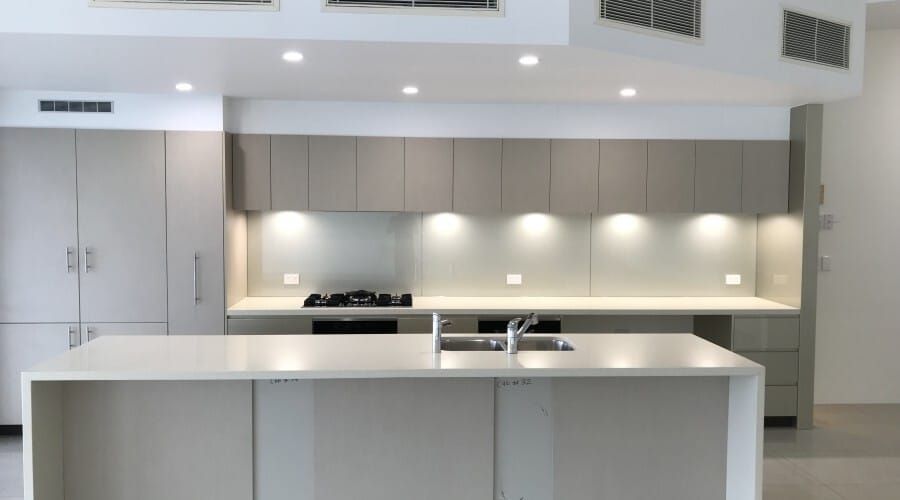 A Kitchen with A Large Island in The Middle of The Room — Waltlec Industries In Garbutt, QLD