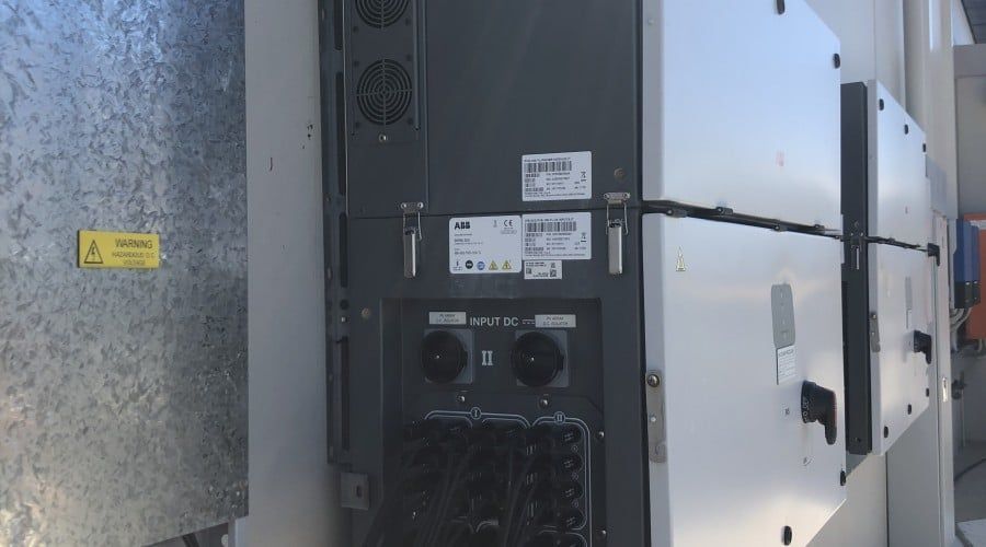 A Black and White Box with A Yellow Caution Sign on It — Waltlec Industries In Garbutt, QLD