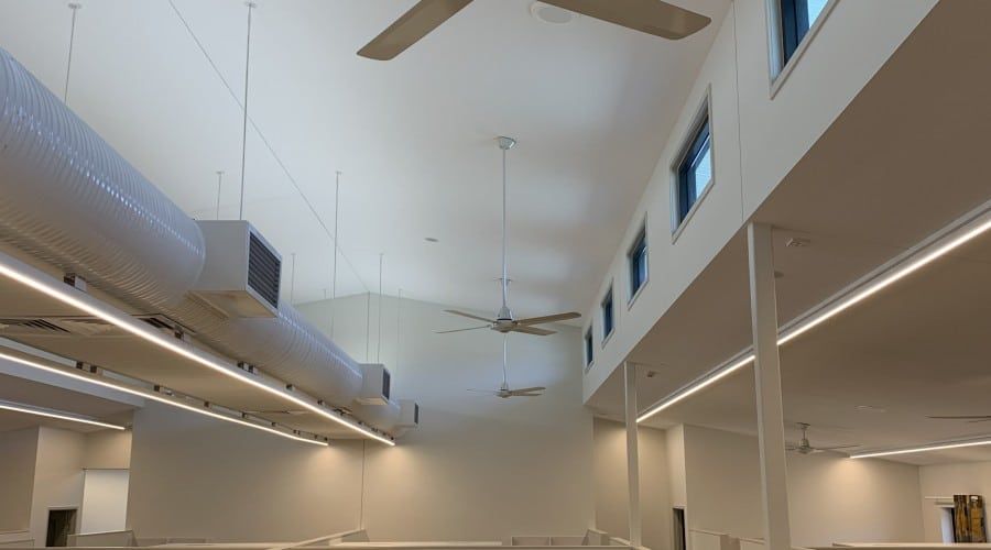 A Large Room with A Ceiling Fan Hanging from The Ceiling — Waltlec Industries In Garbutt, QLD