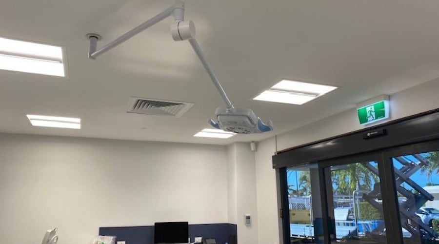 A Ceiling Light Is Hanging from The Ceiling of A Room — Waltlec Industries In Garbutt, QLD