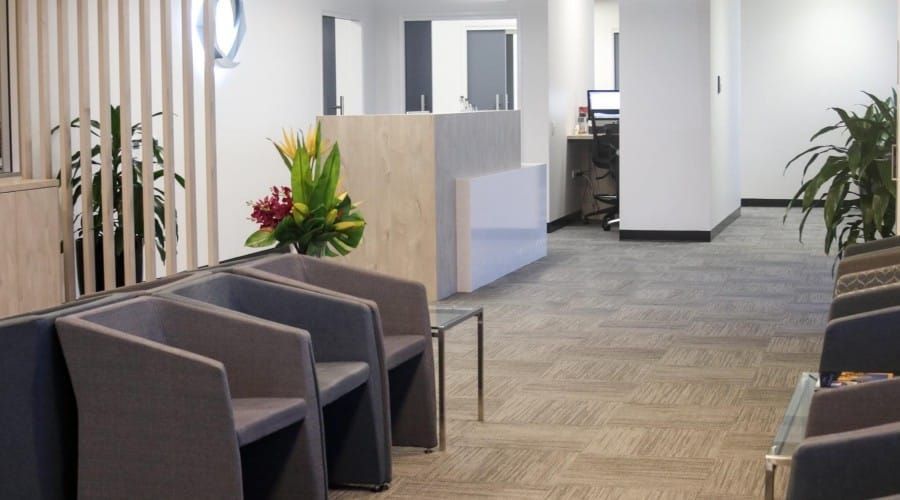 A Waiting Room with A Row of Chairs and A Table — Waltlec Industries In Garbutt, QLD