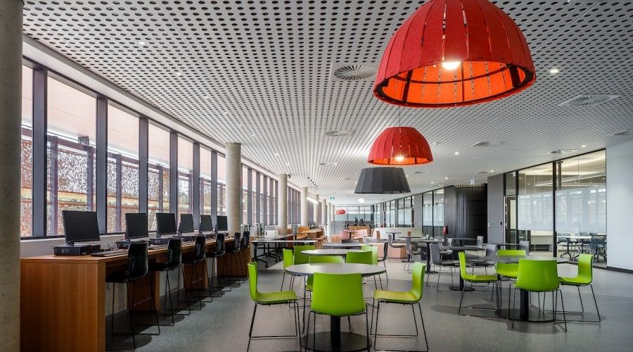 A Large Room with Tables and Chairs and A Lot of Windows — Waltlec Industries In Garbutt, QLD