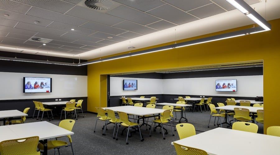 A Large Room with Lots of Tables and Chairs — Waltlec Industries In Garbutt, QLD