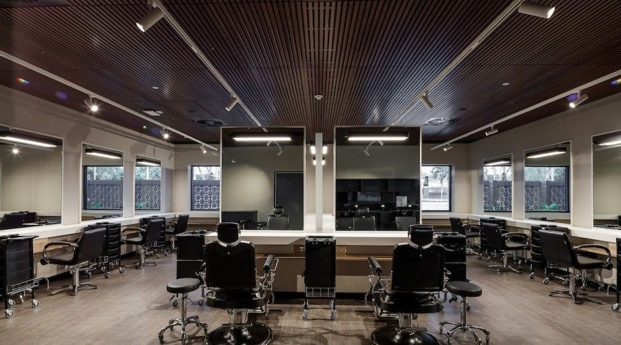 A Large Room with A Lot of Chairs and Mirrors — Waltlec Industries In Garbutt, QLD