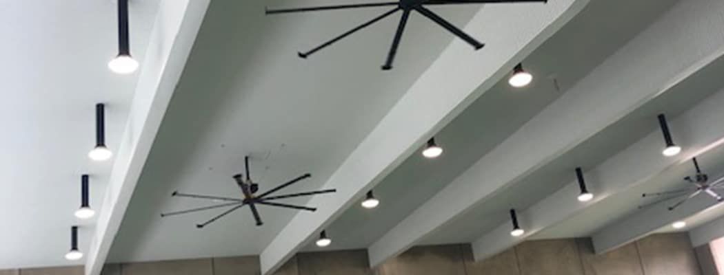 A Ceiling Fan Is Hanging from The Ceiling of A Room — Waltlec Industries In Garbutt, QLD