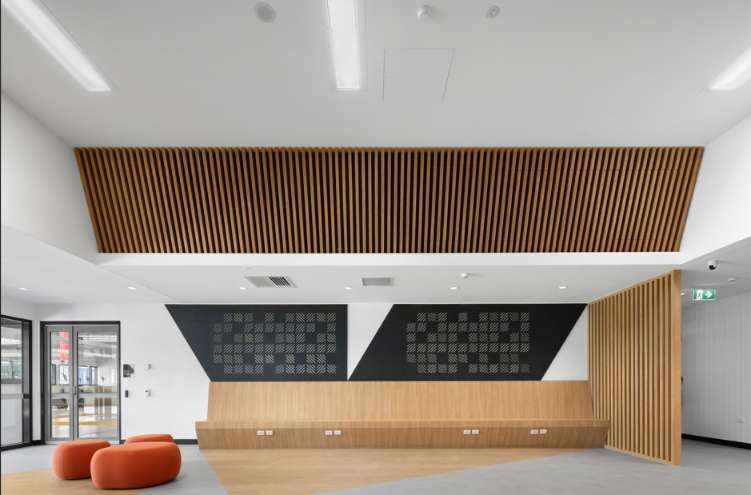 A Large Room with A Wooden Ceiling and A Chalkboard on The Wall — Waltlec Industries In Garbutt, QLD