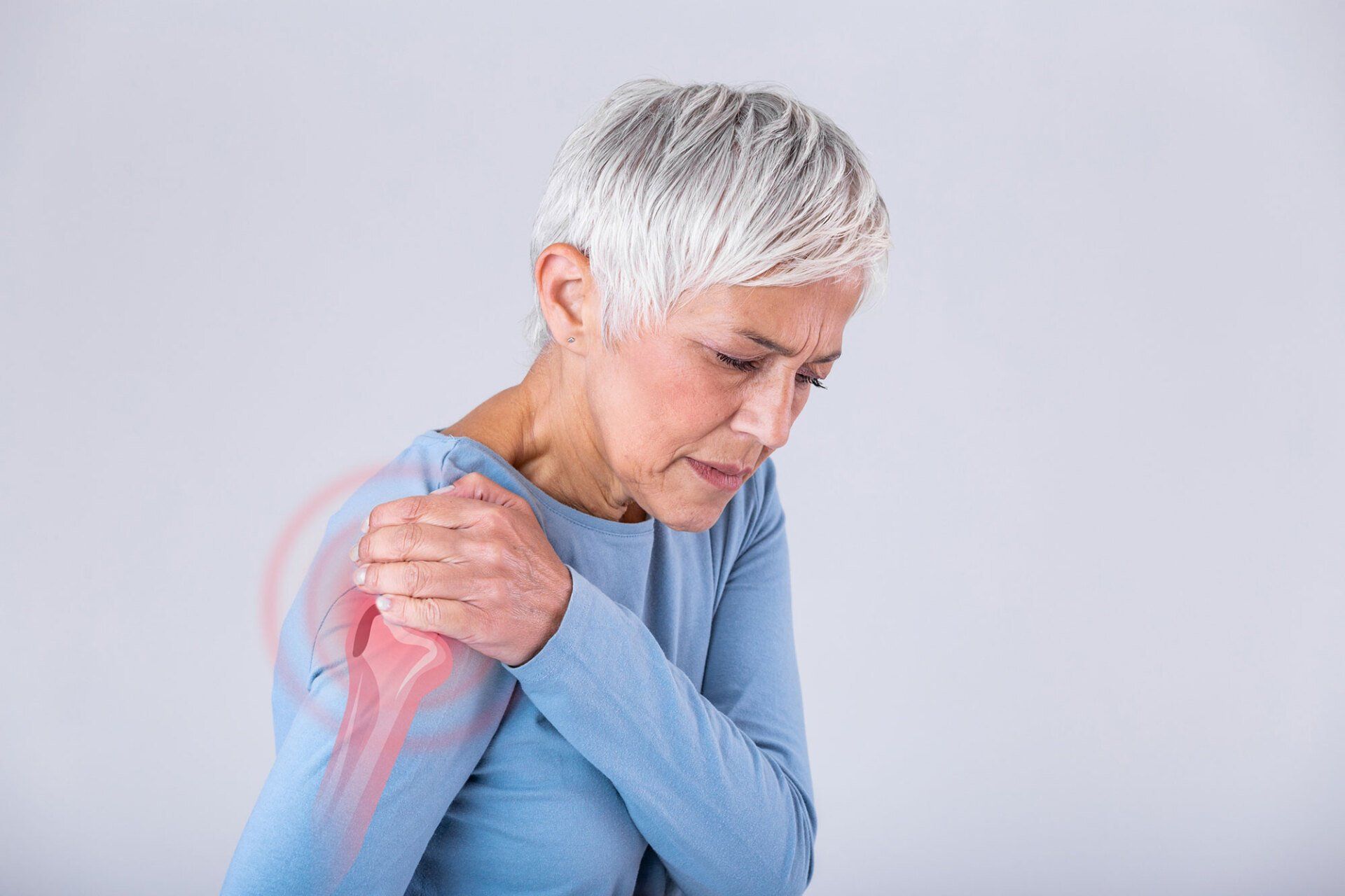Senior Woman with Shoulder Pain — Hawley, PA — Pocono Chiropractic Clinic