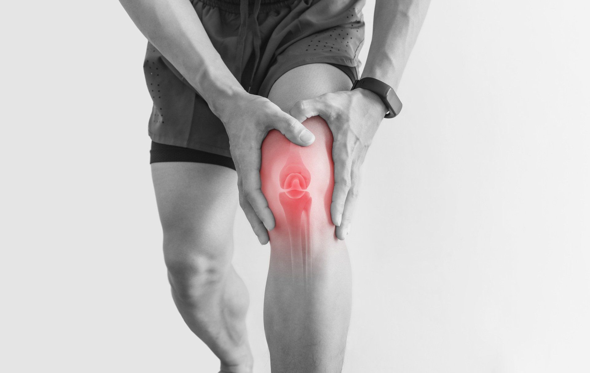 Man Touching Knee — Hawley, PA — Pocono Chiropractic Clinic