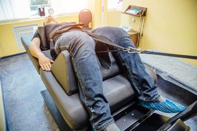 Man at Non-Surgical Spinal Decompression Procedure — Hawley, PA — Pocono Chiropractic Clinic