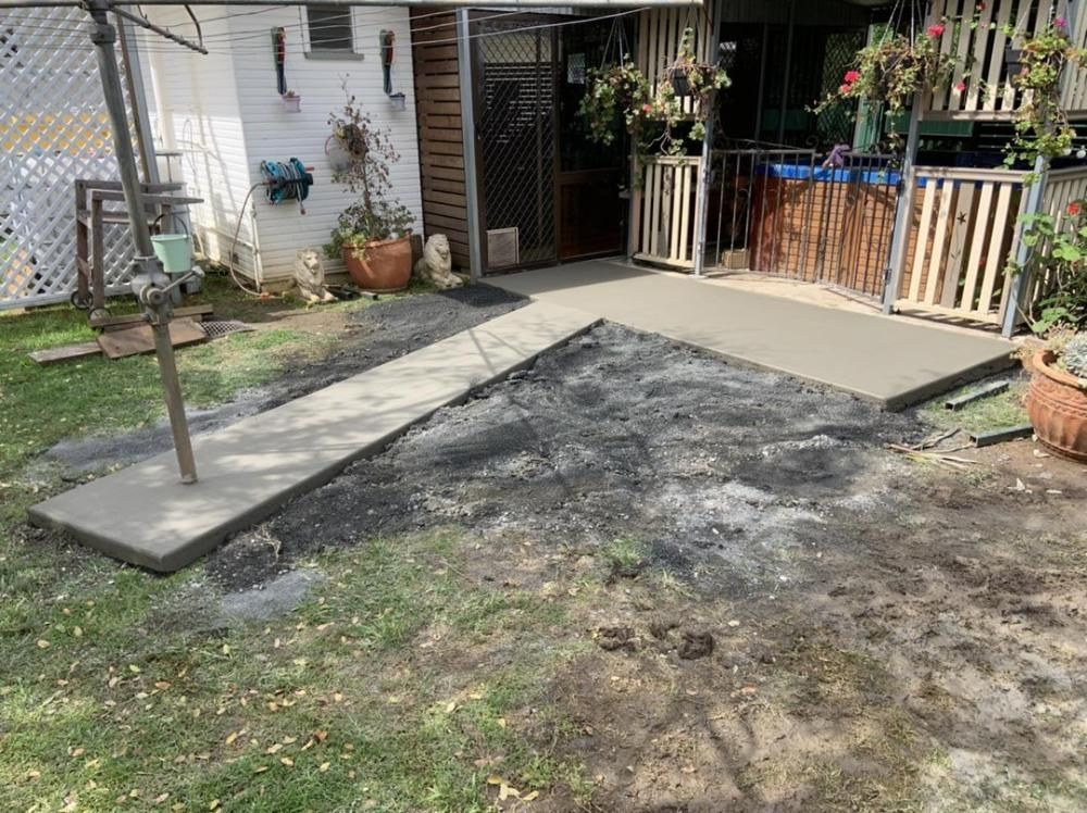Concrete Walkway is Being Built in the Backyard of a House — Pedro's Concreting in Millmerran, QLD