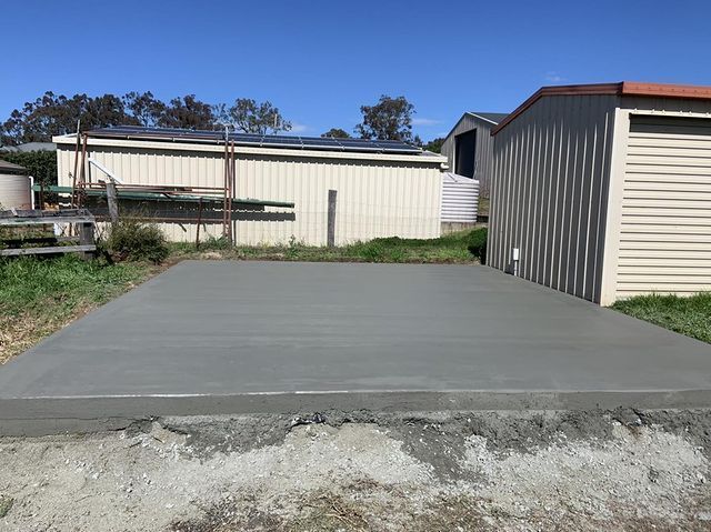 Concrete Driveway is Being Built in Front of a Shed — Pedro's Concreting in Pittsworth, QLD