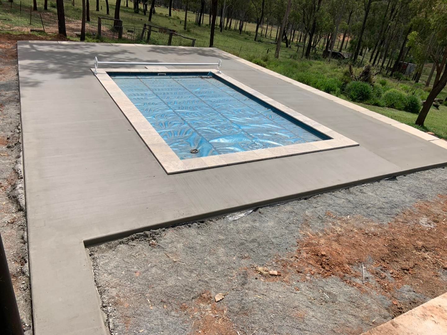 A Large Swimming Pool Is Being Built on Top of A Dirt Field — Pedro's Concreting in Pittsworth, QLD