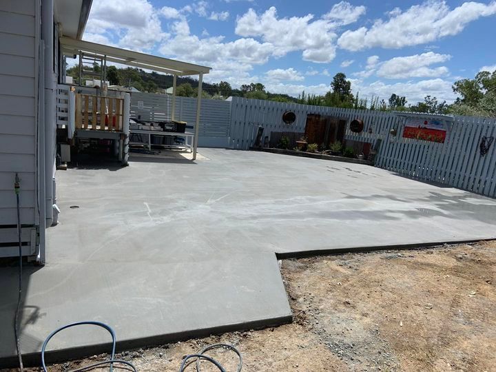 A Concrete Patio Is Being Built in Front of A House — Pedro's Concreting in Pittsworth, QLD