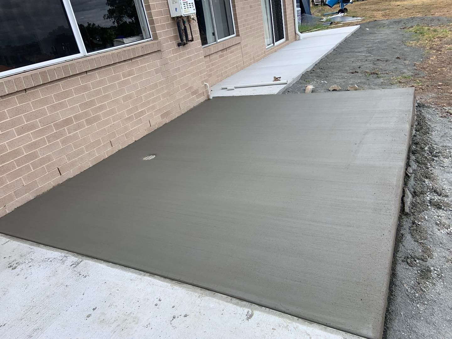 Fresh Concrete Poured Outside A House — Pedro's Concreting in Pittsworth, QLD