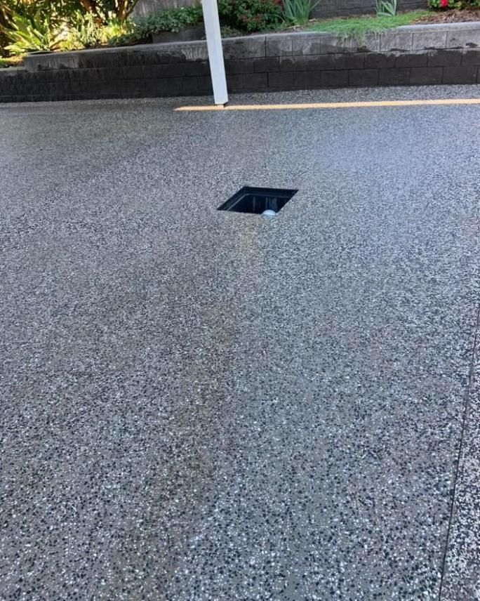 A Concrete Driveway with A Hole in The Middle of It — Pedro's Concreting in Millmerran, QLD