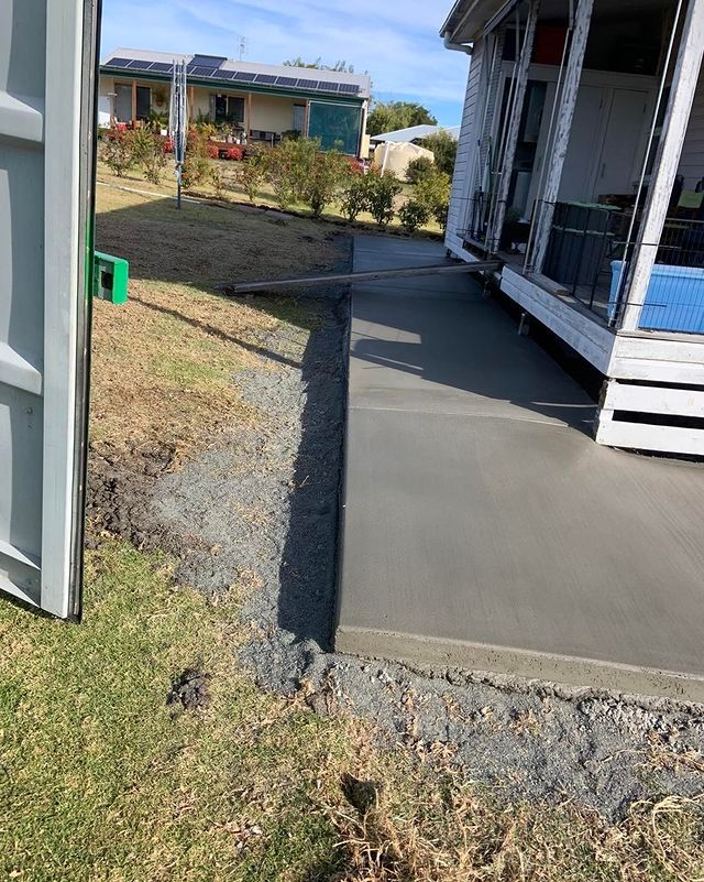 A Concrete Walkway Being Built in Front of a House — Pedro's Concreting in Pittsworth, QLD