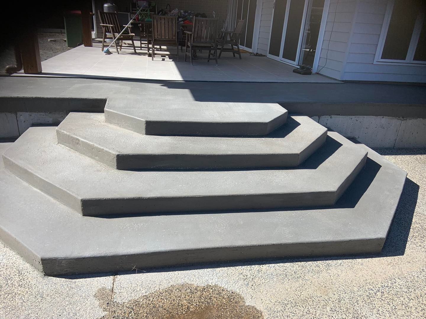 A Set of Concrete Steps Leading Up to a Patio — Pedro's Concreting in Pittsworth, QLD