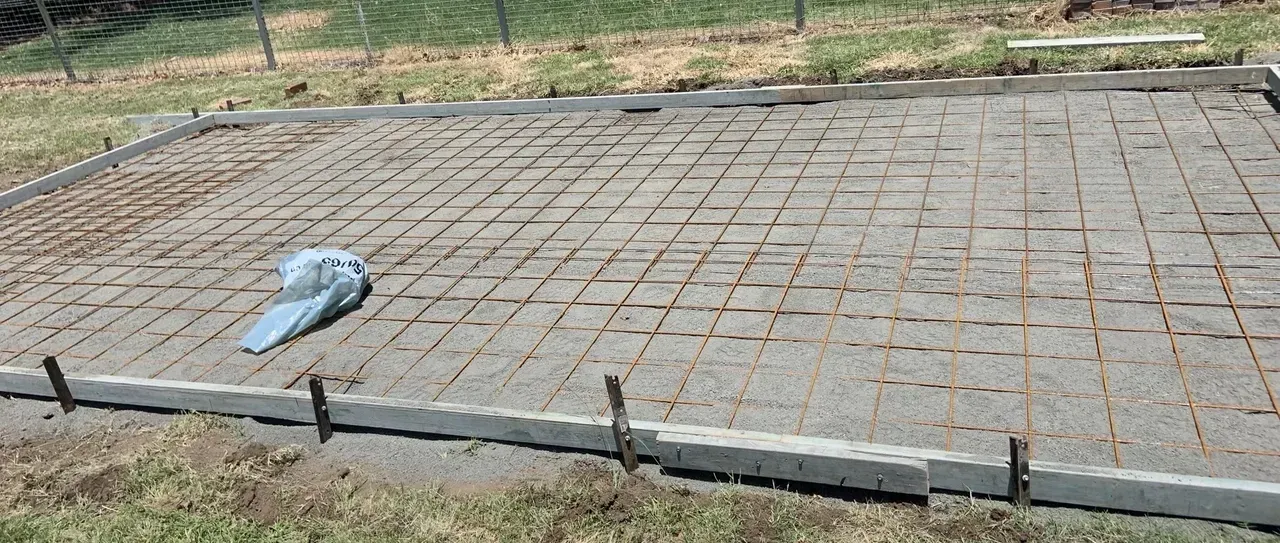 A Concrete Foundation Is Being Built in A Backyard — Pedro's Concreting in Warwick, QLD