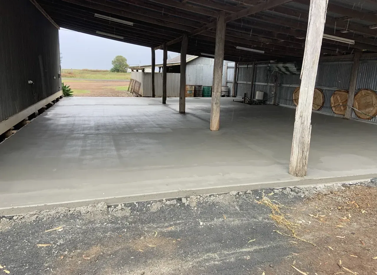 There Is a Concrete Floor in Front of A Barn — Pedro's Concreting in Millmerran, QLD