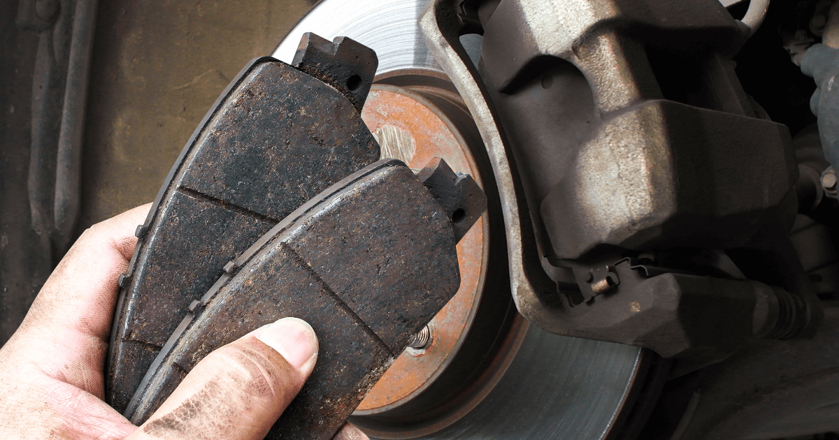 a mechanic doing an inspection inside a car