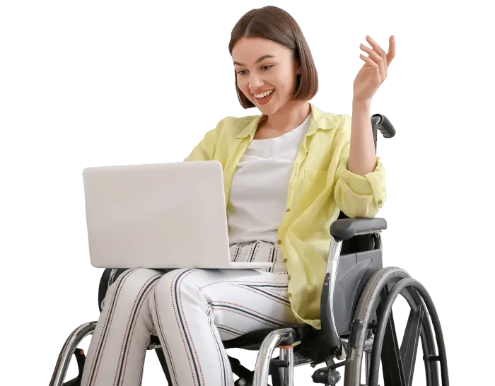 a woman in a wheelchair is using a laptop computer.