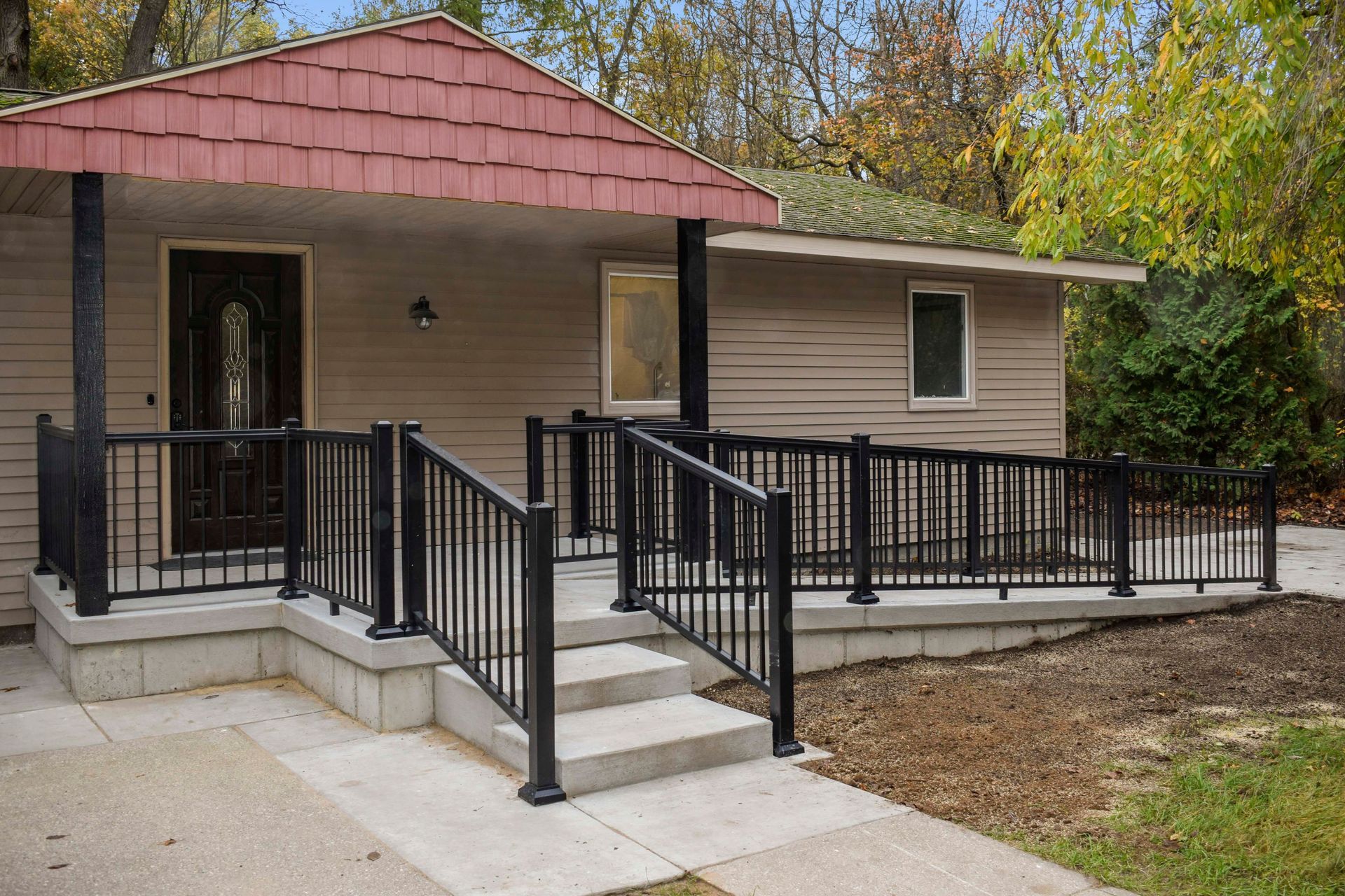 A house with a ramp leading to the front door