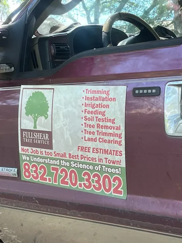 A maroon truck door displaying a company sign for Fullshear Tree Service, listing services and phone number 832-720-3302.