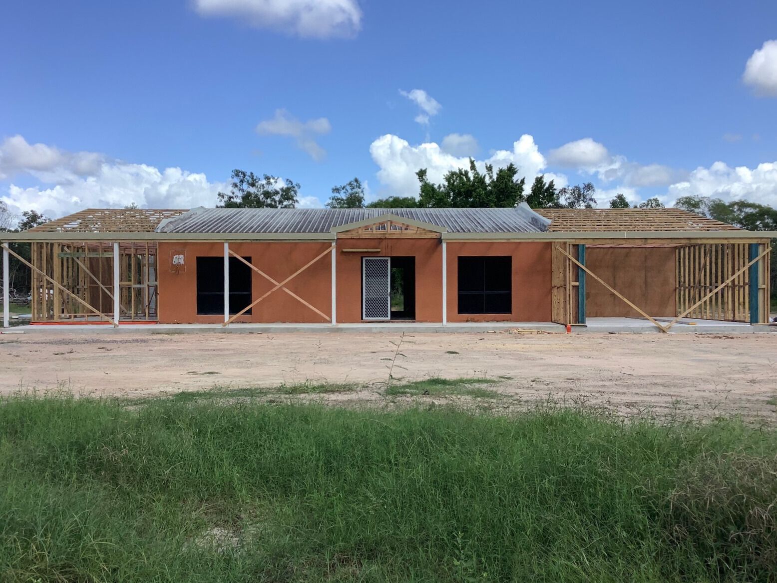 An Orange House Adding Extensions — Darryl Tickle Building Pty Ltd In Alice River, QLD